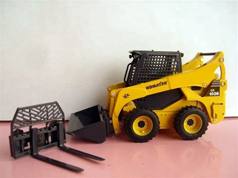 skid-steer loaders toy|toy skid loader with forks.